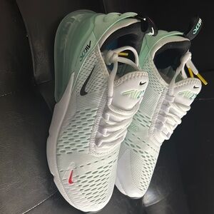 Nike White and Black Sneakers with Sleek Design